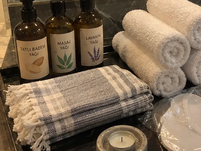 Masaj ve lavanta yağı, rulo havlular ve ekose peştemal — Esenler, Masaj Salonun
